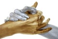 Closeup of gold and silver hands Royalty Free Stock Photo