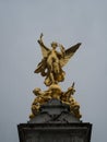 Closeup of golden angel sculpture statue Queen Victoria memorial monument The Mall Buckingham Palace London England UK Royalty Free Stock Photo