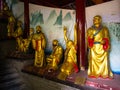 Closeup of a golden Shaolin monk`s Statues in Shaolin Temple. The Shaolin Monastery is also known as the Shaolin Temple. Dengfeng