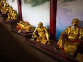 Closeup of a golden Shaolin monk`s Statues in Shaolin Temple. The Shaolin Monastery is also known as the Shaolin Temple. Dengfeng