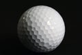 Closeup Golf Ball on Black Royalty Free Stock Photo