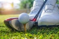 Closeup golf ball on tee ready to be shot Royalty Free Stock Photo