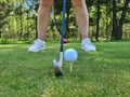 Closeup of golfer ready to tee off