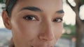 Closeup gorgeous woman eyes looking camera outdoors. Mesmerizing happy girl wink Royalty Free Stock Photo