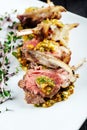 Closeup on gourmet fried lamb chops with sauce