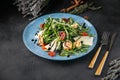 Closeup on gourmet salad with arugula and shrimps