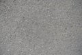 Closeup of grainy surface of dusty asphalt Royalty Free Stock Photo