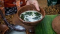 Closeup Grass Jelly green cincau on traditional pottery served in traditional market