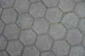 Closeup of gray concrete pavement with honeycomb geometric pattern Royalty Free Stock Photo