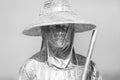 Closeup grayscale of a statue of a salt worker at Salinas de Janubio, Spain