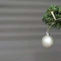 Gold, White and Silver Christmas Ornaments in Christmas Tree Branch Royalty Free Stock Photo