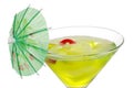 Closeup of a Green martini with an umbrella