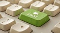 Closeup of Green Start Button on Beige Keyboard Royalty Free Stock Photo
