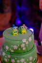 Closeup of green wedding cake top with parrots Royalty Free Stock Photo