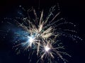 Closeup of green and yellow fireworks against a night sky, new year, party Royalty Free Stock Photo