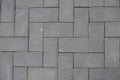 Closeup of grey concrete pavement with herringbone layout Royalty Free Stock Photo