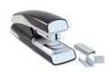 Closeup of a grey office stapler and staples Royalty Free Stock Photo