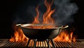 Closeup Of Grill With Fire And Charcoal. Hot empty barbecue BBQ grill with flaming fire and ember charcoal on black background Royalty Free Stock Photo