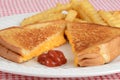 Closeup grilled cheese with ketchup focus on ketch