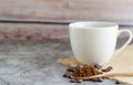 Closeup ground coffee in wooden spoon and fresh roasted coffee beans. Royalty Free Stock Photo