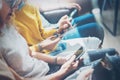 Closeup Group Adult Hipsters Friends Sitting Sofa Using Modern Gadgets.Business Startup Friendship Teamwork Concept Royalty Free Stock Photo