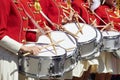 Closeup of group of girls of fans in red military uniform with d