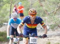 Closeup of group of mountain bike cyclists in the forest