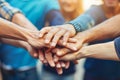 Closeup of group people joining hands together, Unity in diversity