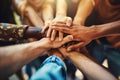 Closeup of group people joining hands together, Unity in diversity