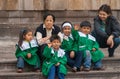 Closeup of Group of small children on steps of church, Lima, Peru