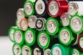 Closeup of group of used disposable  batteries of various color Royalty Free Stock Photo