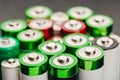 Closeup of group of used disposable  batteries of various color Royalty Free Stock Photo