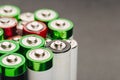 Closeup of group of used disposable  batteries of various color Royalty Free Stock Photo