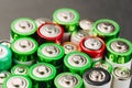 Closeup of group of used disposable  batteries of various color Royalty Free Stock Photo