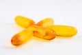 Closeup group of vitamins- supplements or fish oil capsules- healthcare concepts- on white background.