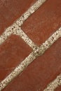 Closeup of grout in a red brick wall with copy space on the exterior of a home, house or city building. Texture and Royalty Free Stock Photo