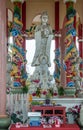 Closeup of Guan Yin in the center of her shrine on Ko Loi Island, Si Racha, Thailand