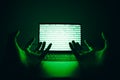 Closeup of hacker is using the laptop computer to coding virus or malware for hacking internet server, Cyber attack, System Royalty Free Stock Photo