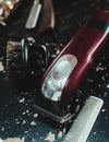 Closeup of hair clippers with barber Duster brush on the table Royalty Free Stock Photo