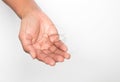 Closeup Hair loss on woman hand on white background