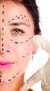 Closeup half of face caucasian woman with dotted lines drawn around left eye, preparing cosmetic surgery Royalty Free Stock Photo