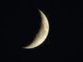 Closeup of a half moon, quarter moon against a black background