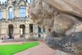 Closeup half naked faunus statue playing panpipe at Zwinger palace in Dresden Royalty Free Stock Photo