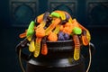 Closeup halloween candy in cauldron Royalty Free Stock Photo