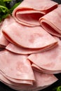 Closeup ham slices, dark background Royalty Free Stock Photo