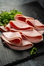 Closeup ham slices over dark background Royalty Free Stock Photo