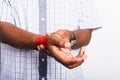 Black man holds his wrist hand injury, feeling pain Royalty Free Stock Photo