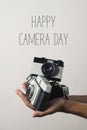 Film camera and text world photography day Royalty Free Stock Photo