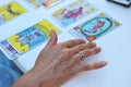 A woman reading the future and fortune in tarot cards