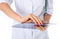 Closeup hand of a doctor with writing tablet. Diagnosis